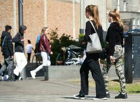 People are Walking at Main Shopping Center of Downtown City Centre of Luton City, England Great Britain UK. Image Captured on June 2nd, 2023 photo