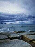 Photo of the ocean viewed from a rocky shore