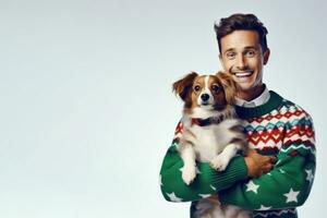 Banner, poster with copy space for International Ugly Sweater Day. man in colorful, hilariously terrible sweater, cheerfully laughing, holding purebred toy spaniel puppy dog. Mock up. AI generated photo