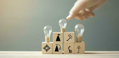 Creative idea, solution and innovation concept. Idea generation for business development. Wooden cube blocks with light bulb and cycle icons on clean background and copy space. AI Generative photo