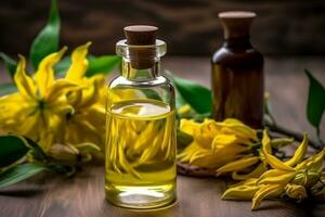 ylang ylang or cananga odorata flower essential oil alongside ylang ylang or cananga odorata flower on a table photo