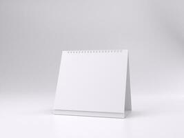 3D render empty white desk calendar mockup template photo with white background front left view