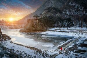 Snow-capped mountains and frozen rivers on a clear day  in winter in sunset, South Korea. photo