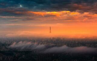 The beauty of Seoul at sunset covered in fog, Seoul, Korea. photo