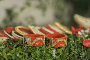 Indian Punjabi Choora pre wedding ceremony, ritual items, bangles, decorations close up photo