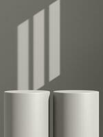 Empty gray podium or pedestal display on gray shadow background with cylinder stand concept photo