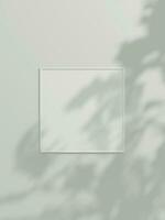 Minimal picture poster frame mockup on white wallpaper with leaf shadow photo