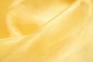 Abstract luxury gold fabric texture background photo