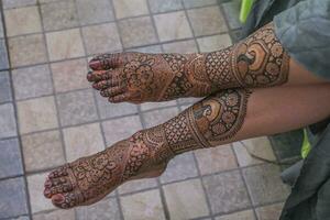 Mehndi Design Indian bride leg mehndi Indian wedding photo