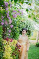 Traditional Thai costume Beautiful Woman Smile Happy photo