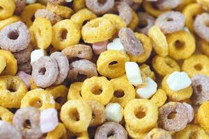 Multi colored fruit loops background. Close up photo