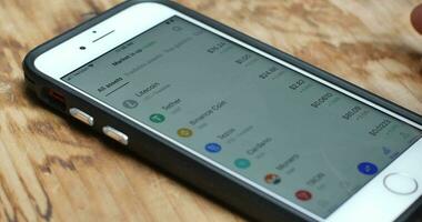 Checking Different Cryptocurrencies on Phone video