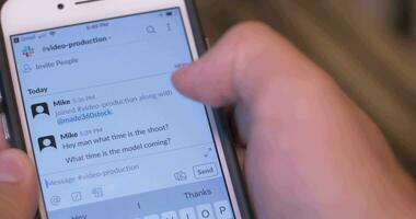 Using Slack App To Message Coworkers On Phone video