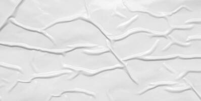 white crumpled and creased plastic bag texture background photo
