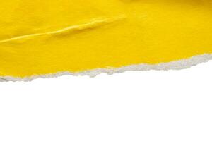 Yellow ripped paper torn edges strips isolated on white background photo