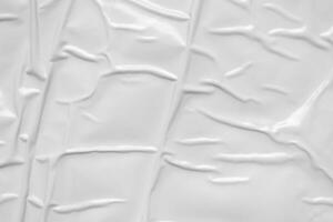 white crumpled and creased plastic bag texture background photo