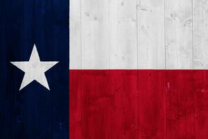 Texas US state flag on textured background. Conceptual collage. photo