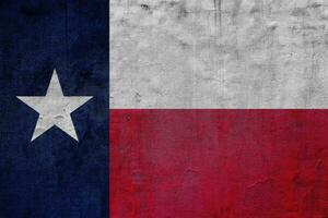 Texas US state flag on textured background. Conceptual collage. photo