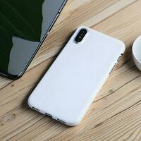 White blank phone case mockup on a table ai generate photo