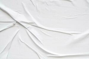 White blank crumpled and creased paper poster texture background photo