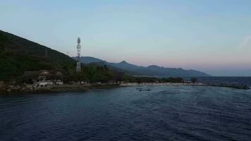 aerial view of beach scene with mountains video