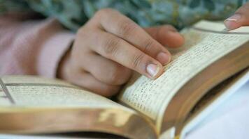 Muslim women's hand reading quran video