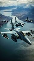 Fighter jets flying in formation over the ocean photo