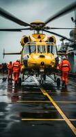 Helicopter landing on the deck of a ship photo