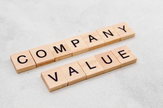 parte superior ver de empresa valor palabra en de madera cubo letra bloquear en blanco antecedentes. negocio concepto foto