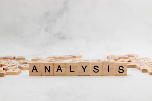 Top view of Analysis word on wooden cube letter block on white background. Business concept photo