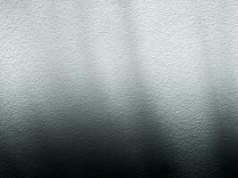 Rough white concrete wall, glossy black, for designing a background for your product. photo