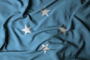 selective focus of Micronesia flag with waving cloth texture. 3d illustration photo
