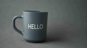 blue coffee cup with hello word video