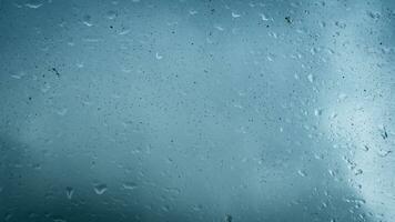 rain water drops on glass photo