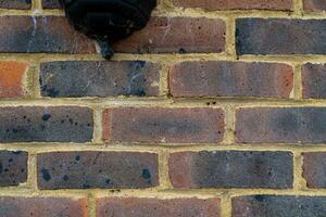 texture background of red brick wall photo