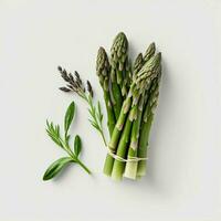 On a white background, there is a bunch of fresh, healthy green asparagus with green leaves attached. AI Generative photo