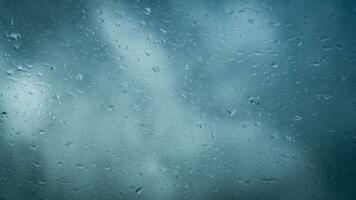 lluvia agua gotas en vaso foto