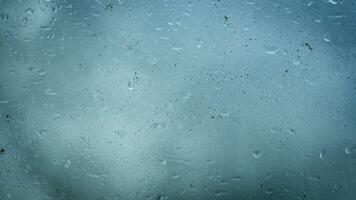 lluvia agua gotas en vaso foto