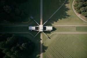 Harnessing the Power of the Sun Aerial View of Solar Panels in a Green Environment. AI Generated. photo