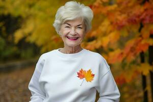 sonriente más viejo mujer con otoño hojas antecedentes. generar ai foto