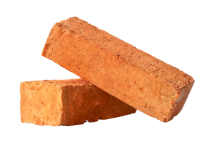 Cracked old red or orange bricks in stack isolated with clipping path in png file format