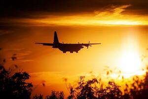 Untitled military transport plane at air base. Airport and airfield. Air force and army flight operation. Aviation and aircraft. Air lift. Military industry. Fly and flying. photo