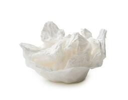 Single screwed or crumpled tissue paper or napkin in strange shape after use in toilet or restroom isolated on white background with clipping path photo