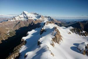 Majestic Snow Capped Mountain Against a Clear Blue Sky. AI Generated. photo