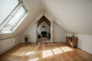 Serene Elegance Exploring the Spacious Attic Designs Bathed in Natural Light. AI Generated. photo