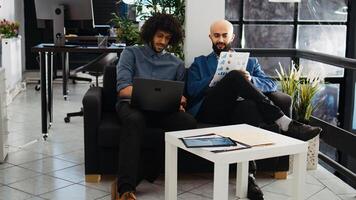 Team of people find business solutions, thinking about new investment ideas to work on startup development. Entrepreneurs meeting in boardroom open space, annual project collaboration. photo