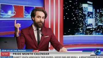 Late night show host on live television presenting hot daily topics and latest celebrities scandals. Man broadcasting reportage about famous people, international tv network content. photo