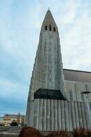 Church of hallgrimskirkja in Iceland circa March 2023, tall sacred building representing lutheran religion. Spectacular icelandic cathedral in reykjavik capital, holy religious monument. photo