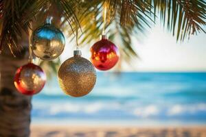 Christmas ornaments gleaming on palm trees along a serene tropical beach photo