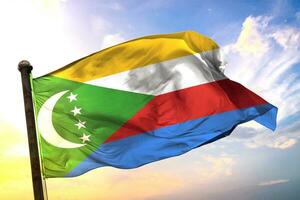 Comoros 3D rendering flag waving isolated sky and cloud background photo